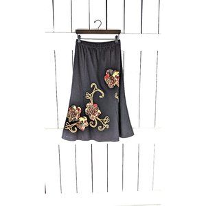 Vintage black stretch knit floral applique trumpet skirt